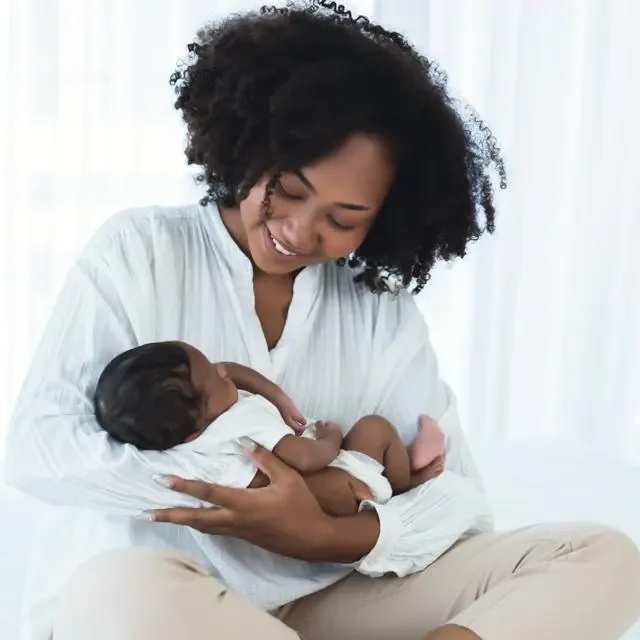 Black mother with baby